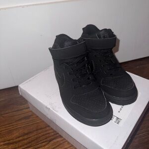 Black High-Top Nike Sneakers